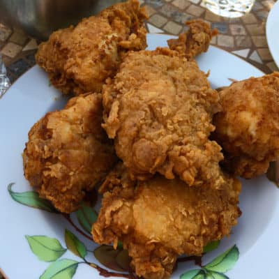 Crispy Fried Chicken on a plate. Crispy fried chicken thatt can be eat as Southern fried Chicken or Korean Fried Chicken. Easy to make at home.