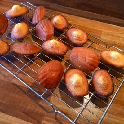 Classic french Madeleines on a cooling rack. These are classic french cakes that are so easy to make at home